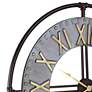 Industry 33" Wide Steel and Gold Open-Face Wall Clock in scene