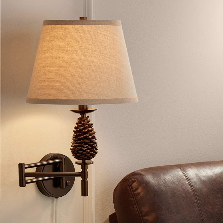 Image 1 Jackie Bronze Pinecone Adjustable Swing Arm Wall Lamp