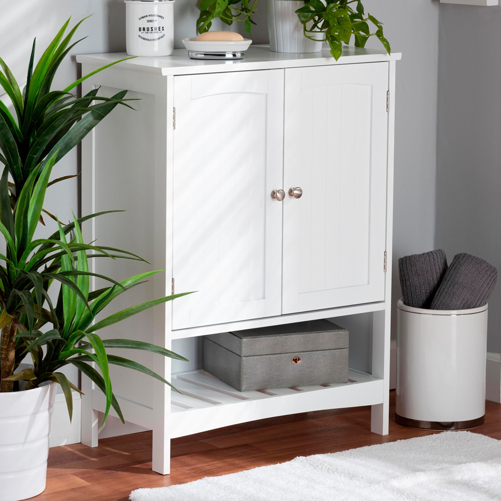 White narrow deals cabinet with doors