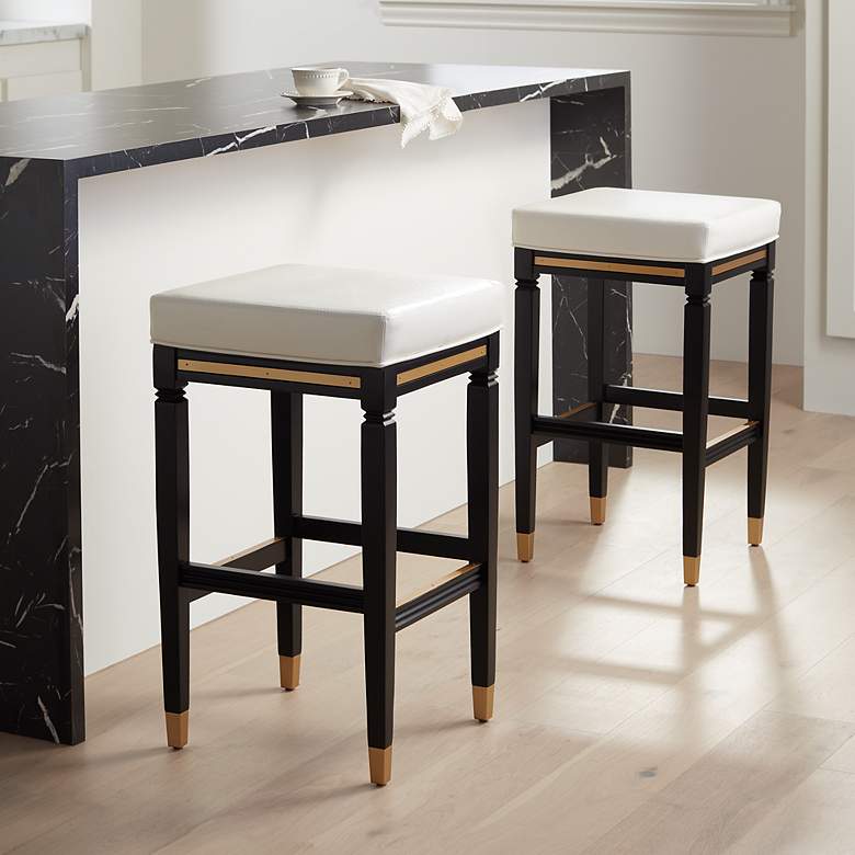 Image 1 Jaxon 31" White Faux Leather and Black Wood Bar Stools Set of 2