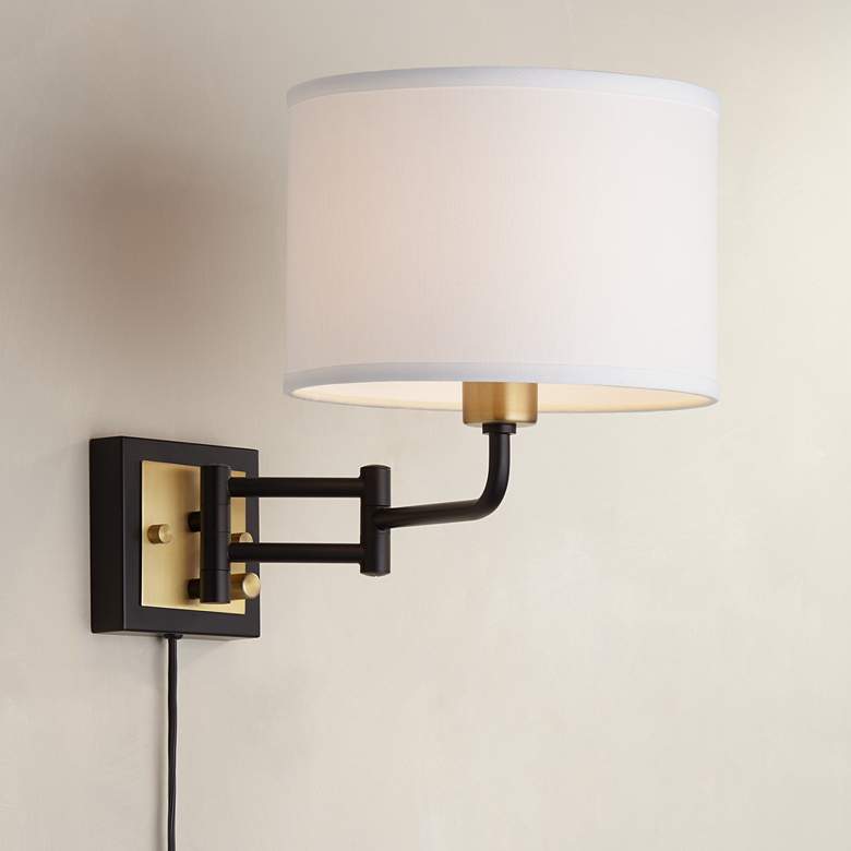 Image 1 Joelle Black and Antique Brass Swing Arm Plug-In Wall Lamp