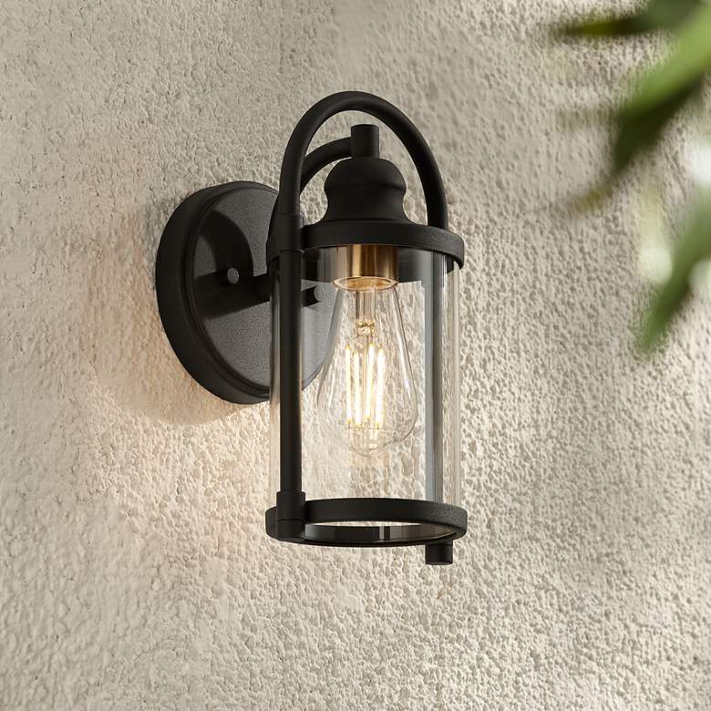 Image 1 John Timberland Avani 10 1/4" High Black and Brass Outdoor Wall Light