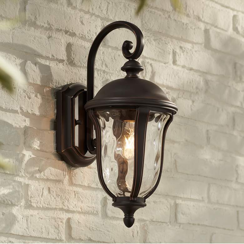 Image 1 John Timberland Park Sienna 16 3/4" Bronze Scroll Outdoor Wall Light