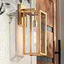 John Timberland Titan 17" Soft Gold Clear Glass Outdoor Wall Light