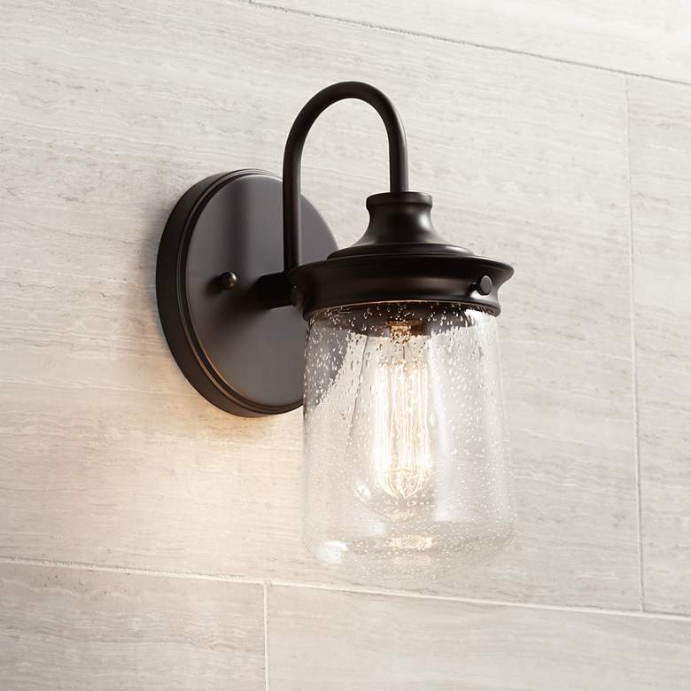 Image 1 John Timberland Tonopah 10 1/2" Seeded Glass and Bronze Wall Sconce