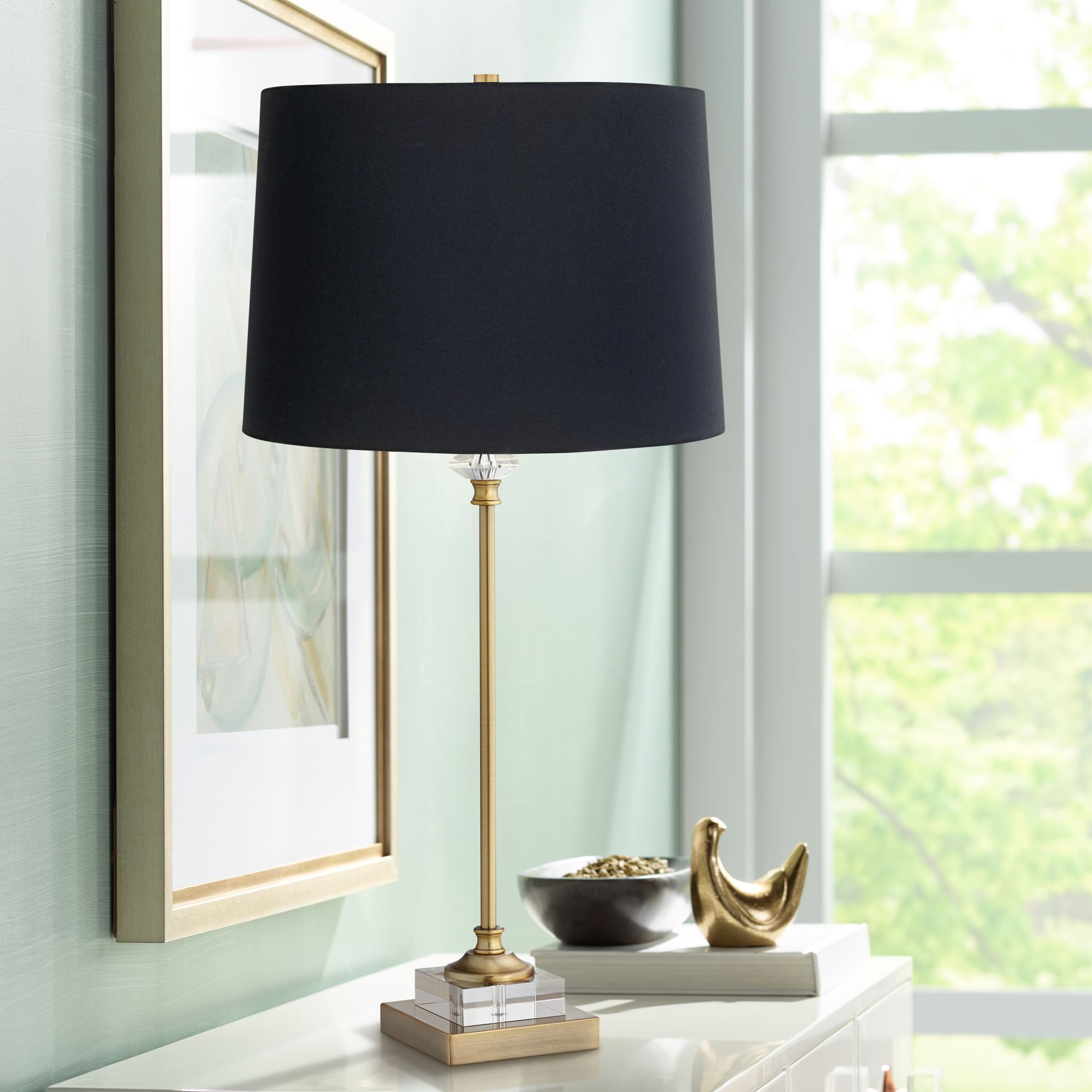 gold table lamp with black shade