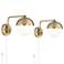 Kelowna Antique Brass Glass Globe Plug-In Swingarm Wall Lamps Set of 2