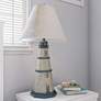 4_Kenroy Home Coastal 32" Antique White Nantucket Lighthouse Table Lamp more views