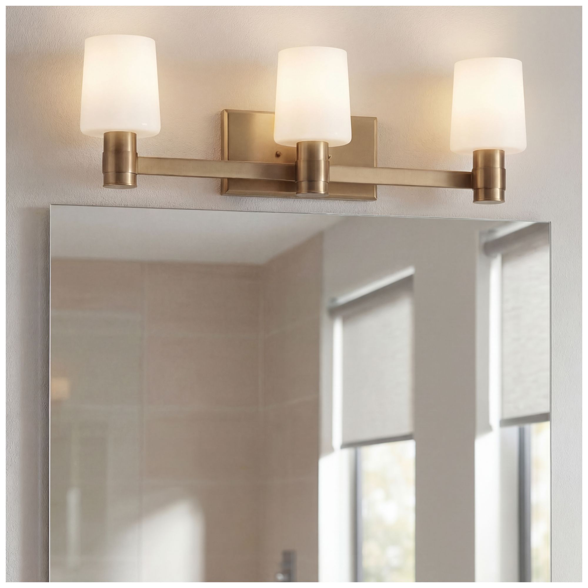 Kichler Adani 24" Wide Champagne Bronze 3-Light Bath Light in scene