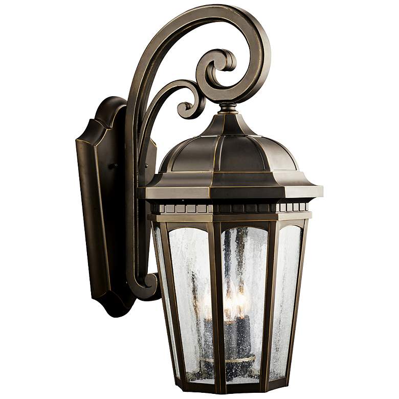 Image 1 Kichler Courtyard 22 1/4" High Scroll Arm Bronze Outdoor Wall Light