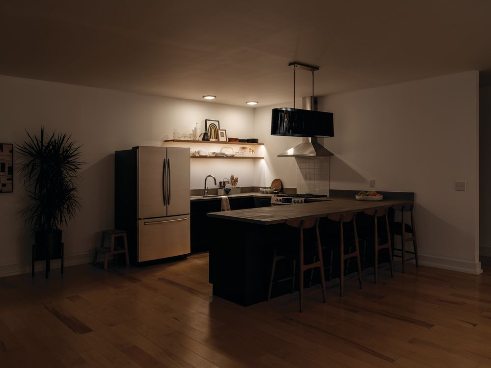 Kichler Linara 40" Brass and Black 5-Light Modern Linear Chandelier in scene