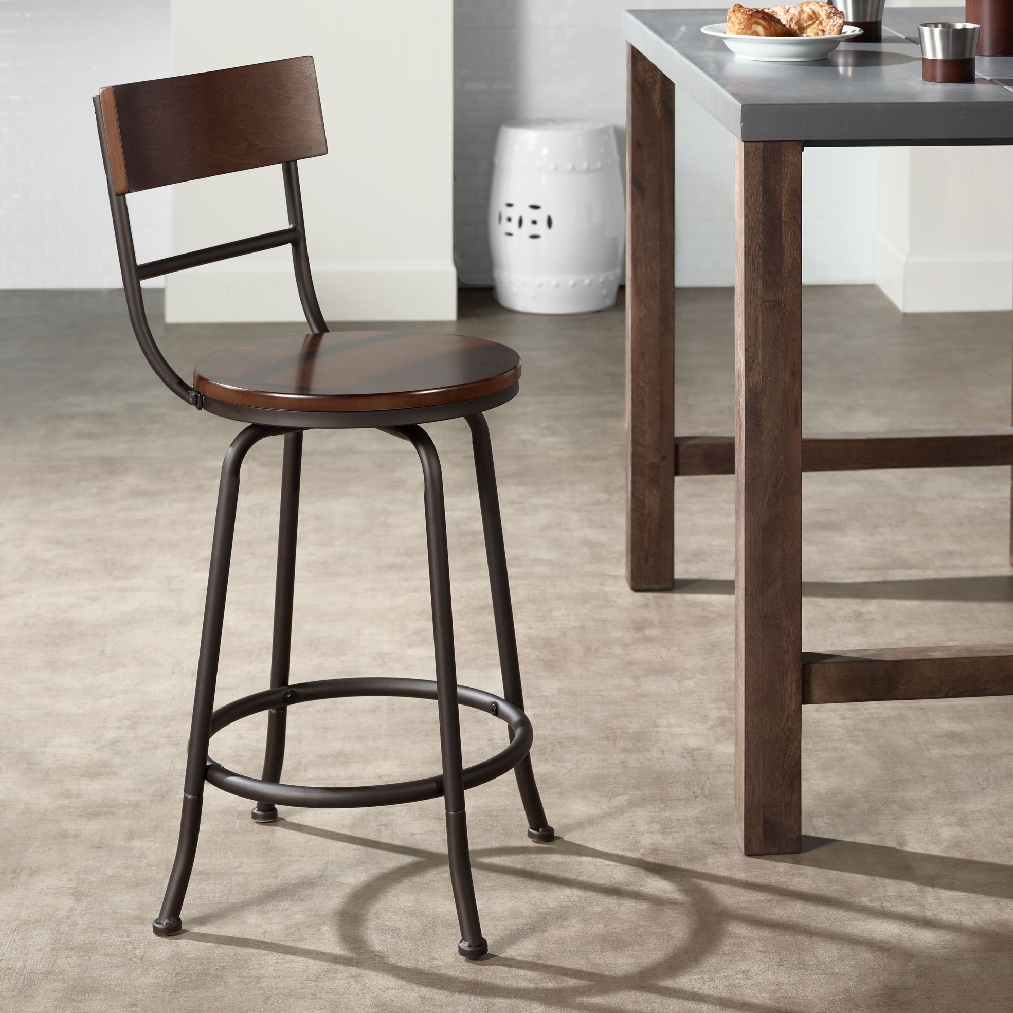 Langdon 24 1/4" Glitter Bronze Swivel Counter Stools Set of 2 in scene