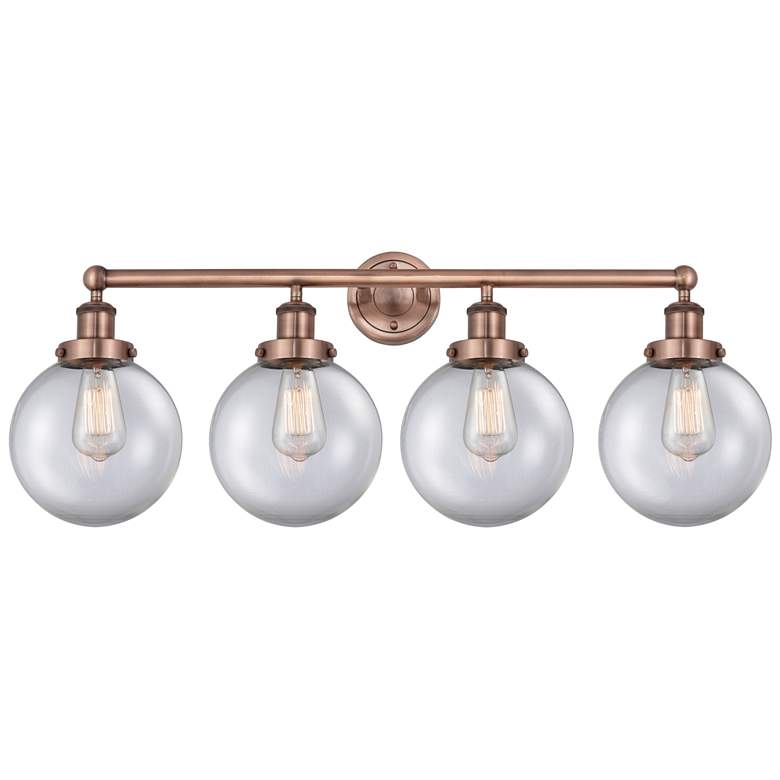 Image 1 Large Beacon 33.5 inchW 4 Light Antique Copper Bath Light With Clear Shade