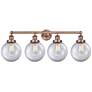 Large Beacon 33.5"W 4 Light Antique Copper Bath Light With Clear Shade