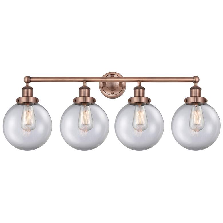 Image 1 Large Beacon 33.5"W 4 Light Antique Copper Bath Light With Clear Shade