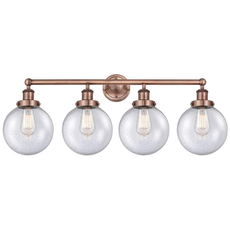 Image 1 Large Beacon 33.5"W 4 Light Antique Copper Bath Light With Seedy Shade