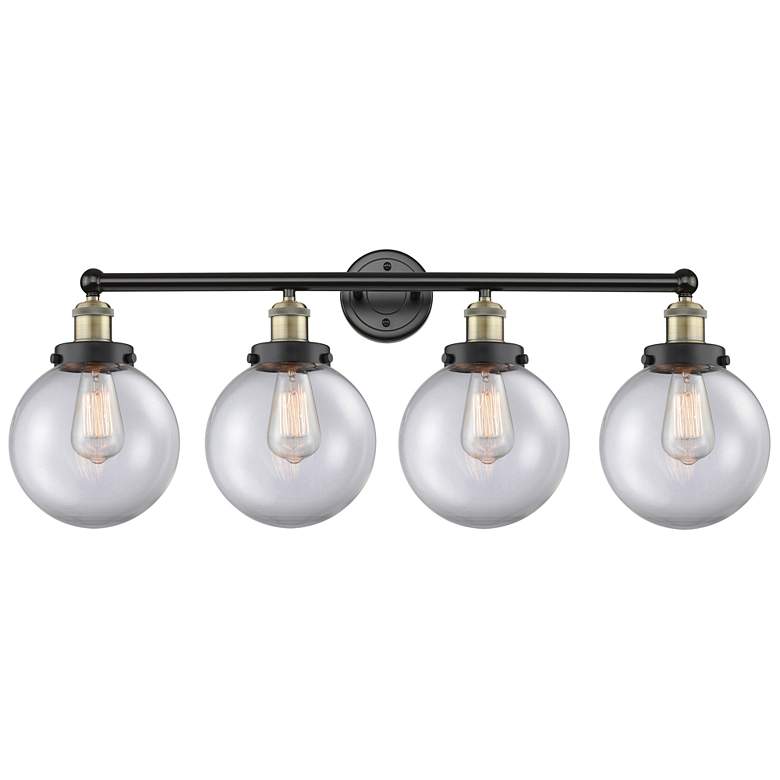Image 1 Large Beacon 33.5"W 4 Light Black Brass Bath Vanity Light w/ Clear Sha