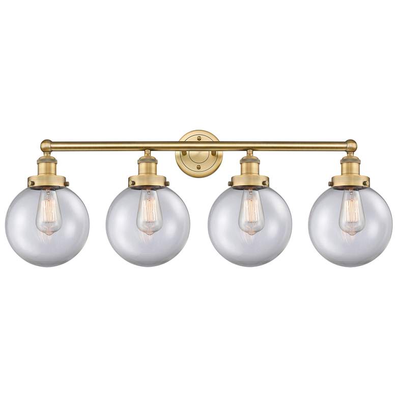 Image 1 Large Beacon 33.5"W 4 Light Brushed Brass Bath Light With Clear Shade