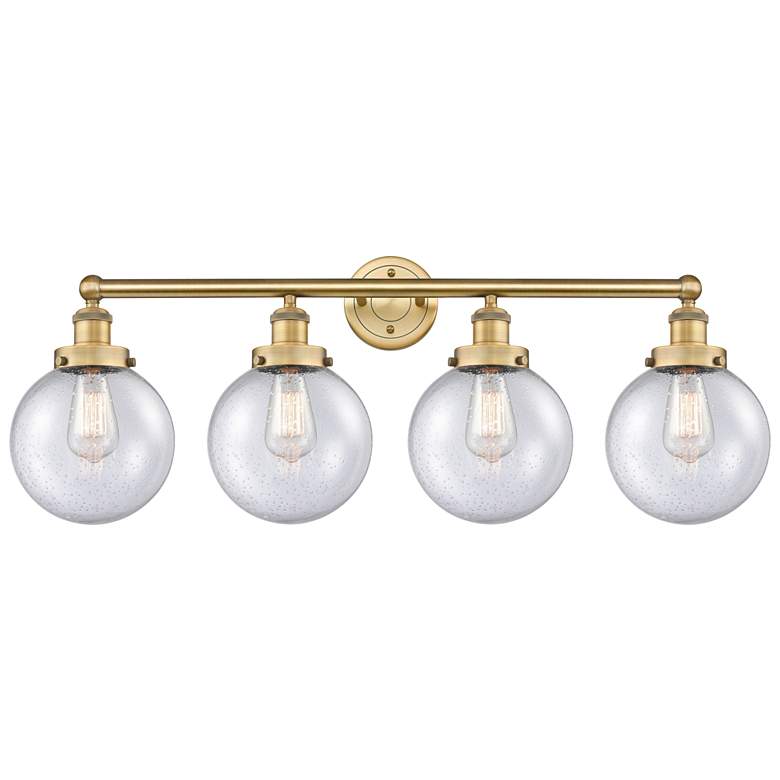 Image 1 Large Beacon 33.5"W 4 Light Brushed Brass Bath Light With Seedy Shade