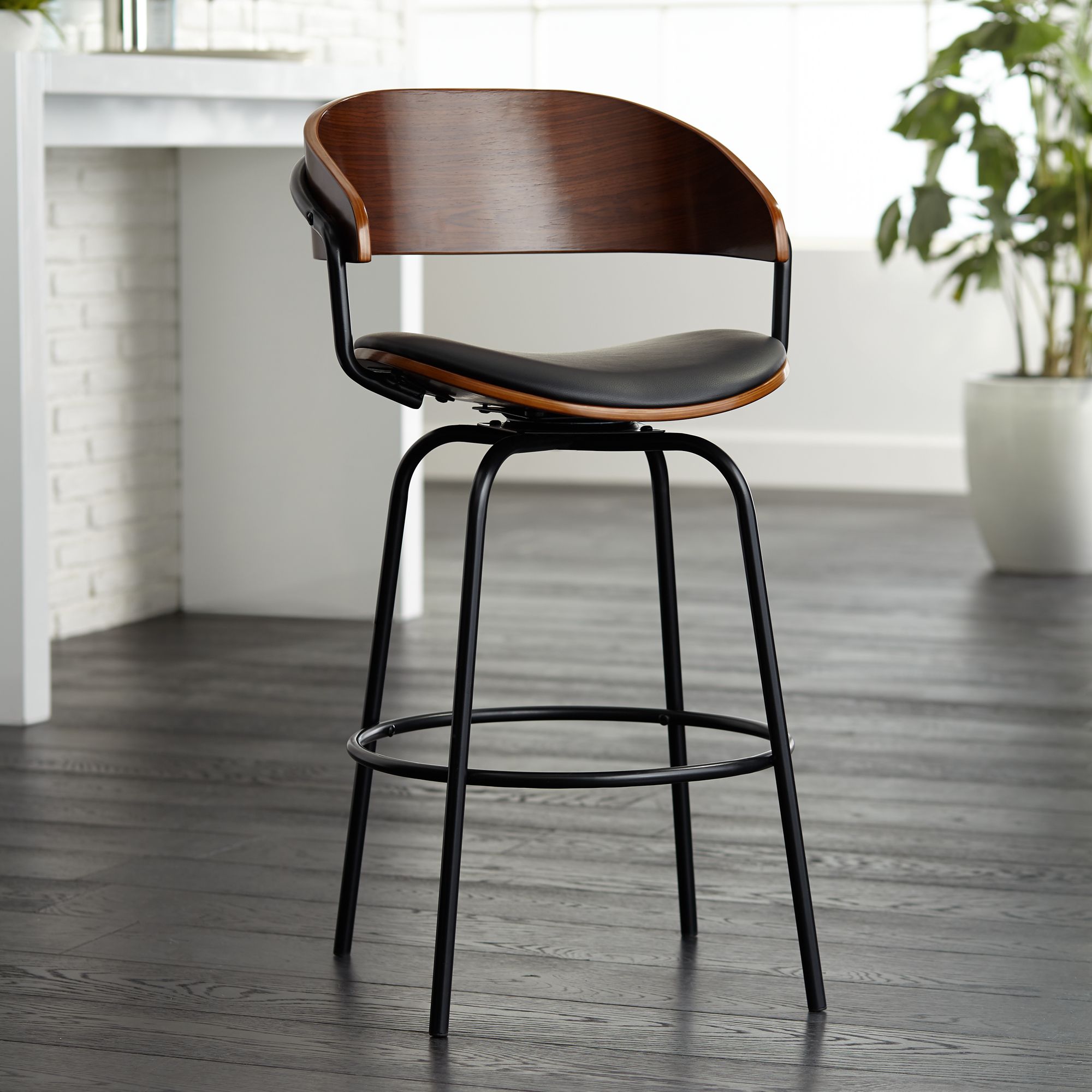Larsen 26" Black Faux Leather Swivel Counter Stools Set of 2 in scene