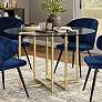 Legend 36" Wide Brushed Gold Round Dining Table in scene