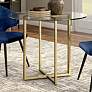 Legend 48" Wide Brushed Gold Round Dining Table in scene