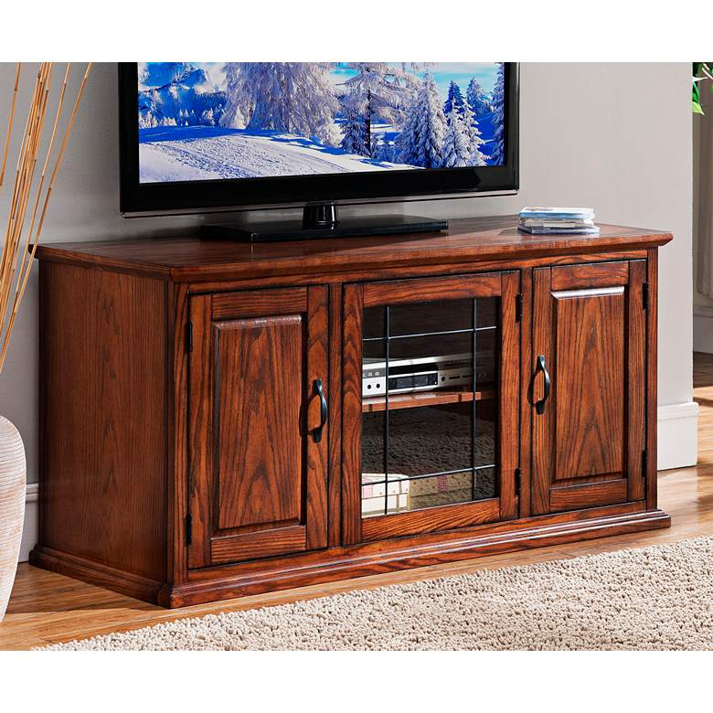 Image 1 Leick 50 inch Wide Burnished Oak 3-Door Leaded Glass TV Cabinet