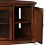 Leick 56" Wide Burnished Oak Leaded Glass Corner TV Cabinet