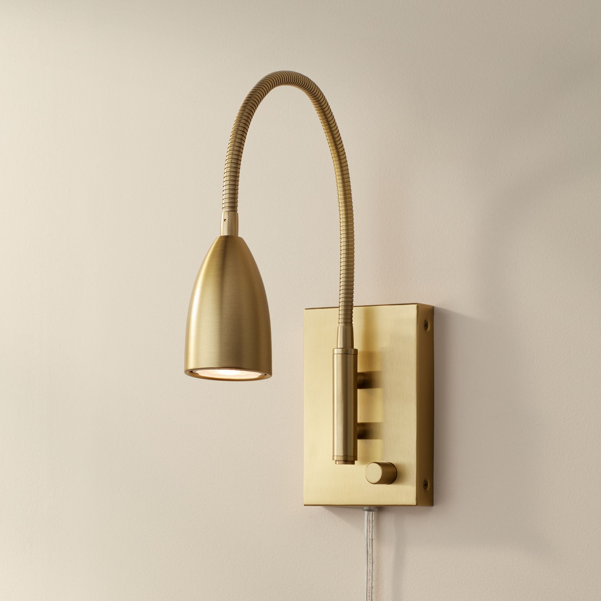 Lido Adjustable Gooseneck Gold Plug-In Wall Reading Light in scene
