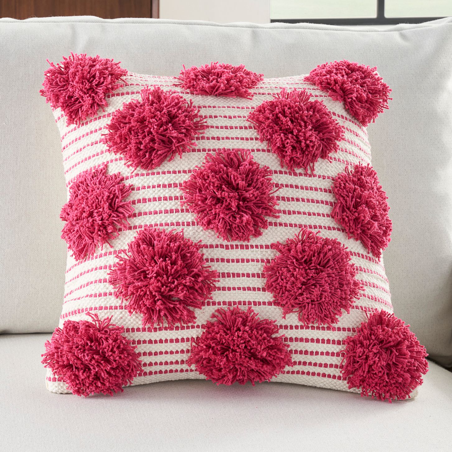 Pink throw discount with pom poms