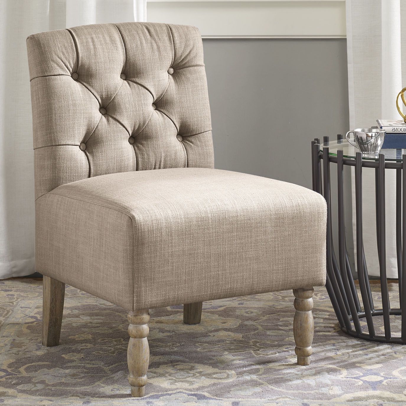 beige armless accent chair