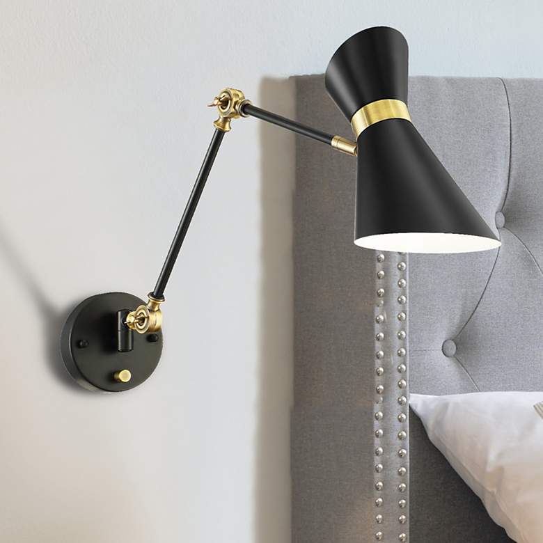 Image 1 Lite Source Jared black and gold wall sconce with adjustable arm and shade