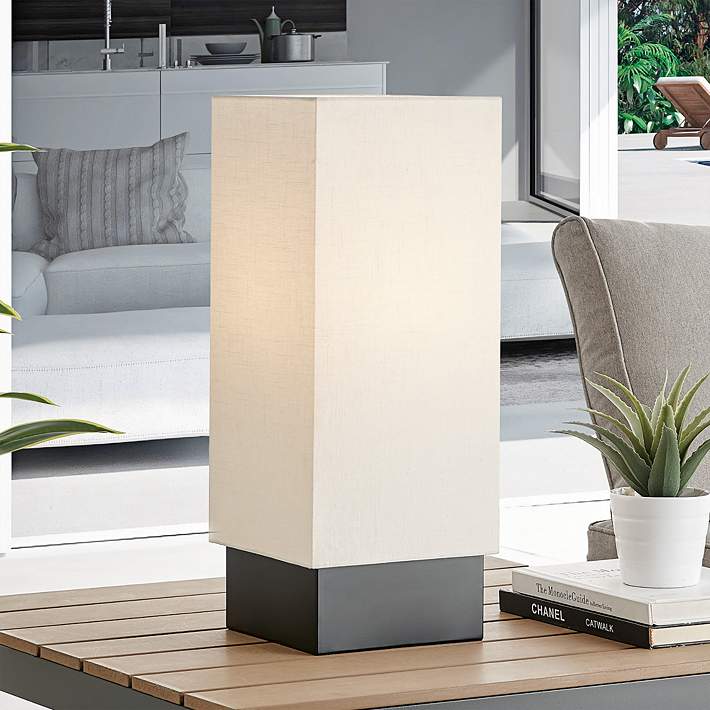 https://image.lampsplus.com/is/image/b9gt8/lite-source-quinlan-battery-powered-outdoor-rated-led-cordless-table-lamp__256p1cropped.jpg?qlt=65&wid=710&hei=710&op_sharpen=1&fmt=jpeg