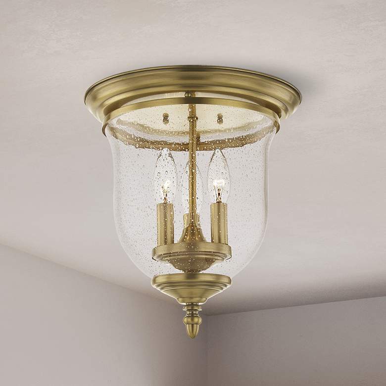 Image 1 Livex Lighitng Legacy 11 1/2" Brass and Seeded Glass Flush Mount Light