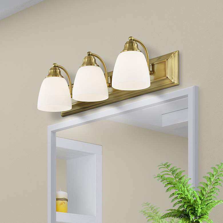 Image 1 Livex Lighting Springfield 24" Wide 3-Light Antique Brass Bath Vanity
