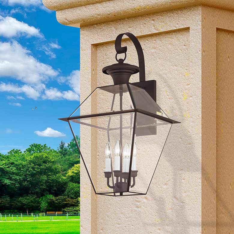Image 1 Livex Lighting Westover 30" High Bronze Outdoor Wall Light