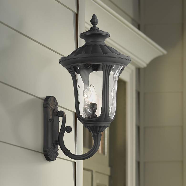 Image 1 Livex Oxford 22" High Textured Black Upward Lantern Outdoor Wall Light
