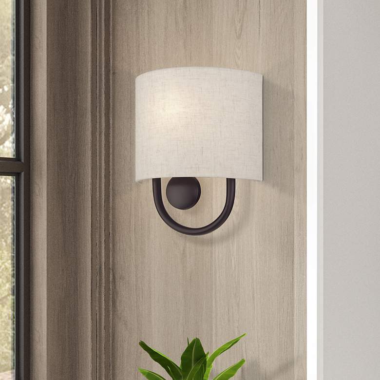 Image 1 Livex Stratton 10 1/2" High Oatmeal Fabric English Bronze ADA Sconce