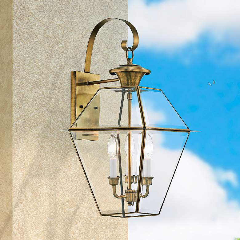 Image 2 Livex Westover 22 1/2" Antique Brass 3-Light Outdoor Wall Light