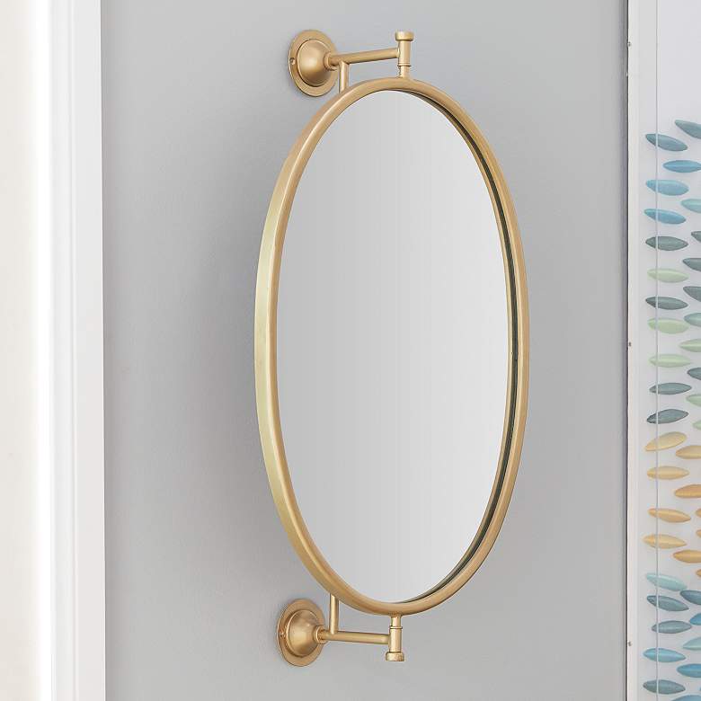 Image 1 Logan Polished Gold Metal 15" x 29" Oval Wall Mirror