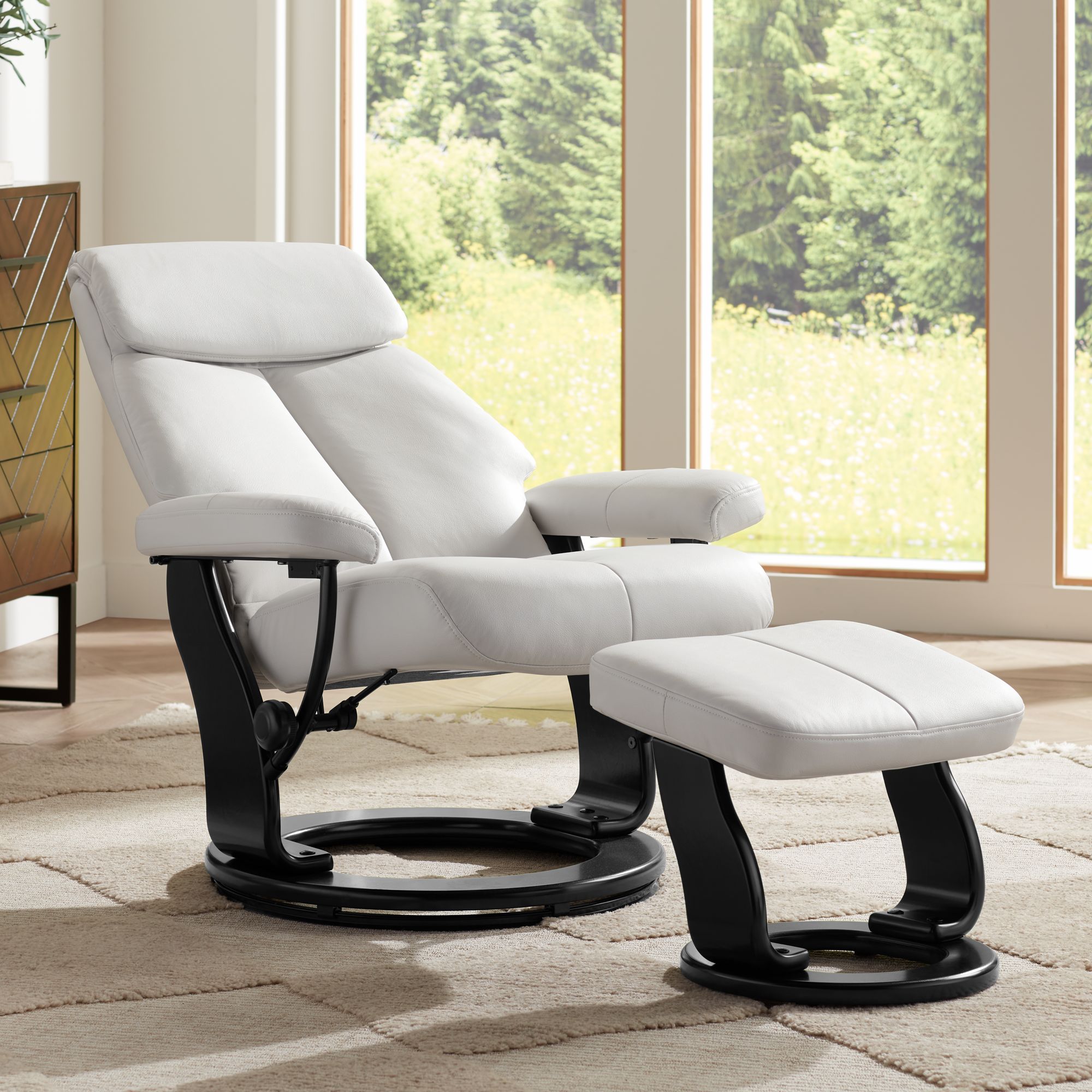 Lucy White Faux Leather Swivel Recliner and Ottoman