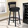 6_Madrid 26 1/2" Black Faux Leather Swivel Counter Stools Set of 2 more views