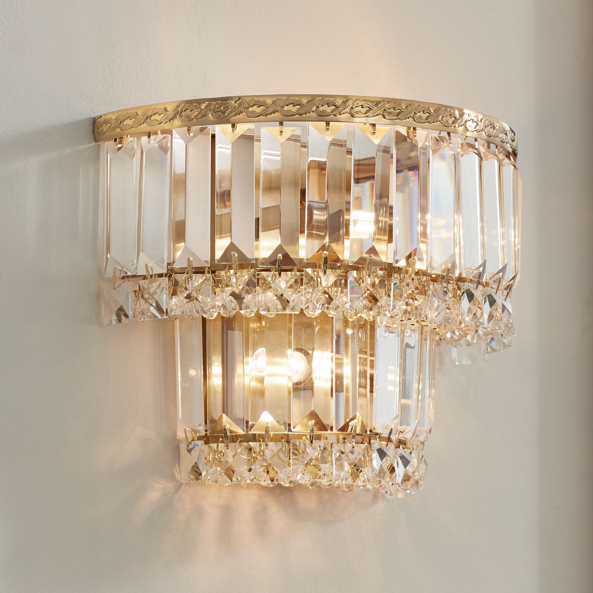 Gold and crystal wall outlet sconces