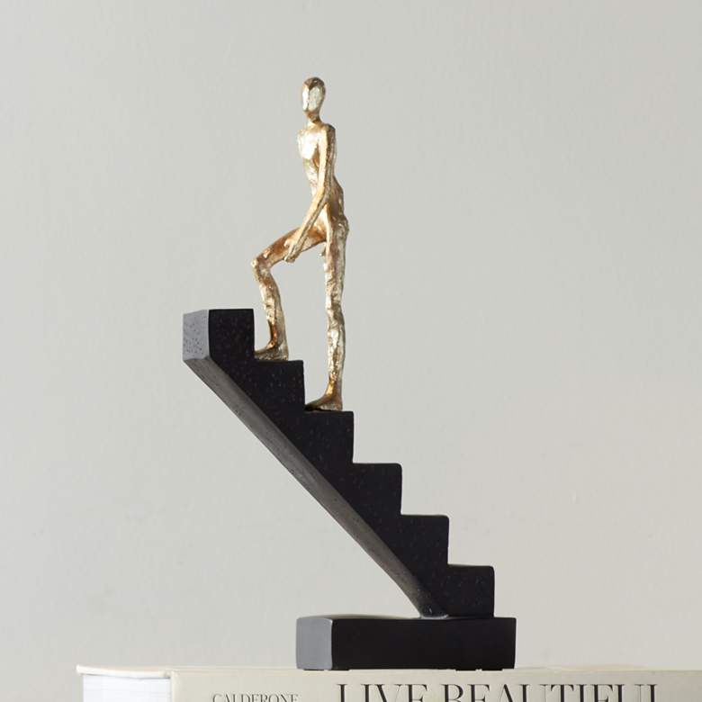 Image 1 Man Walk Up Stairs 11 1/2 inch High Black and Gold Sculpture