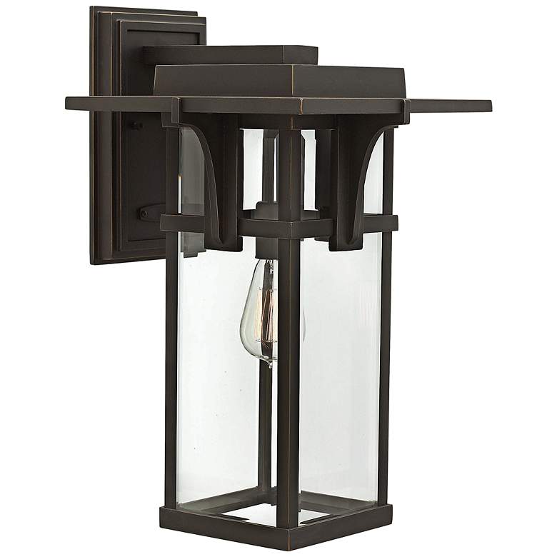Image 1 Manhattan Bronze 18 1/2" High Clear Glass Outdoor Wall Light