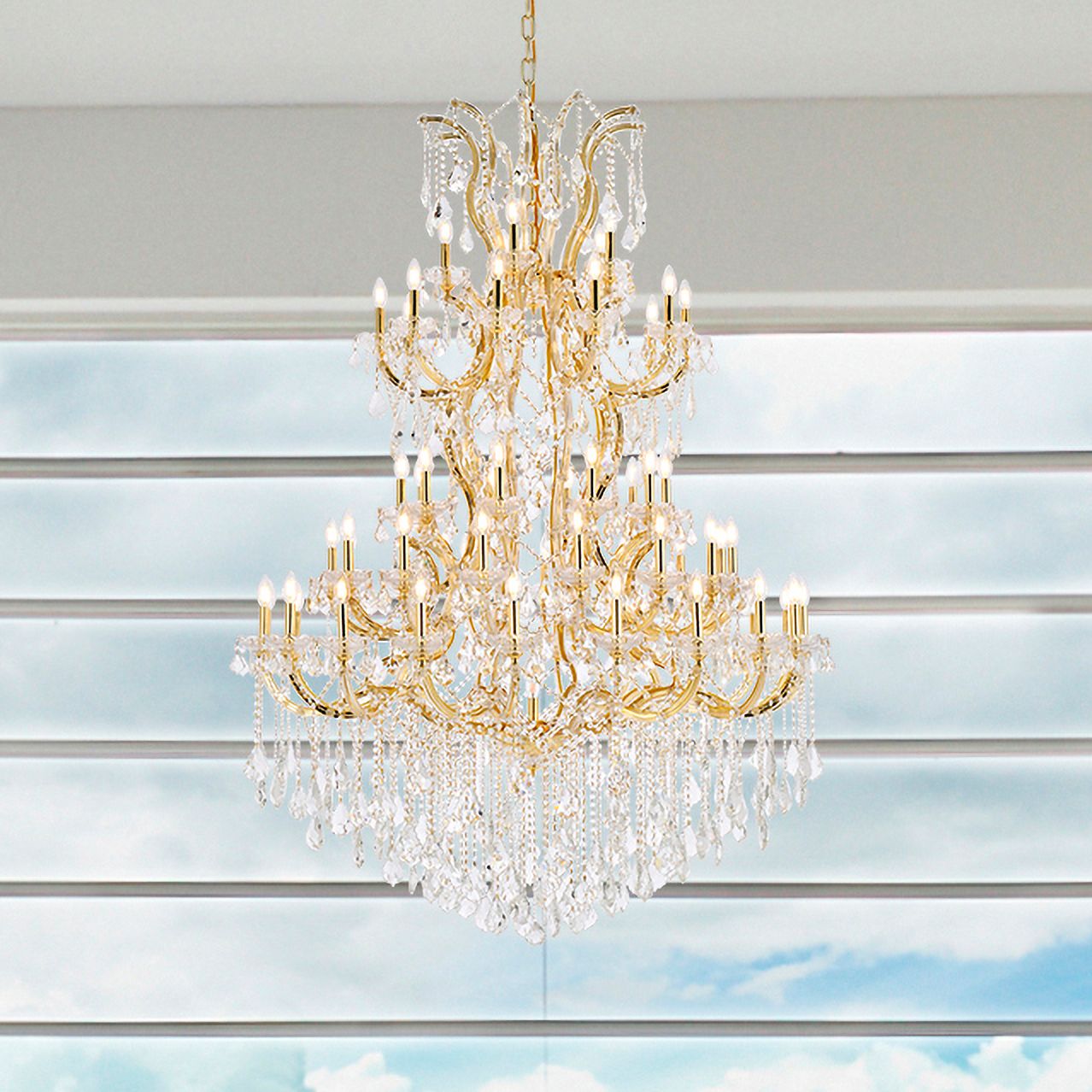 Maria Theresa 54" Wide Gold and Crystal 61-Light Chandelier