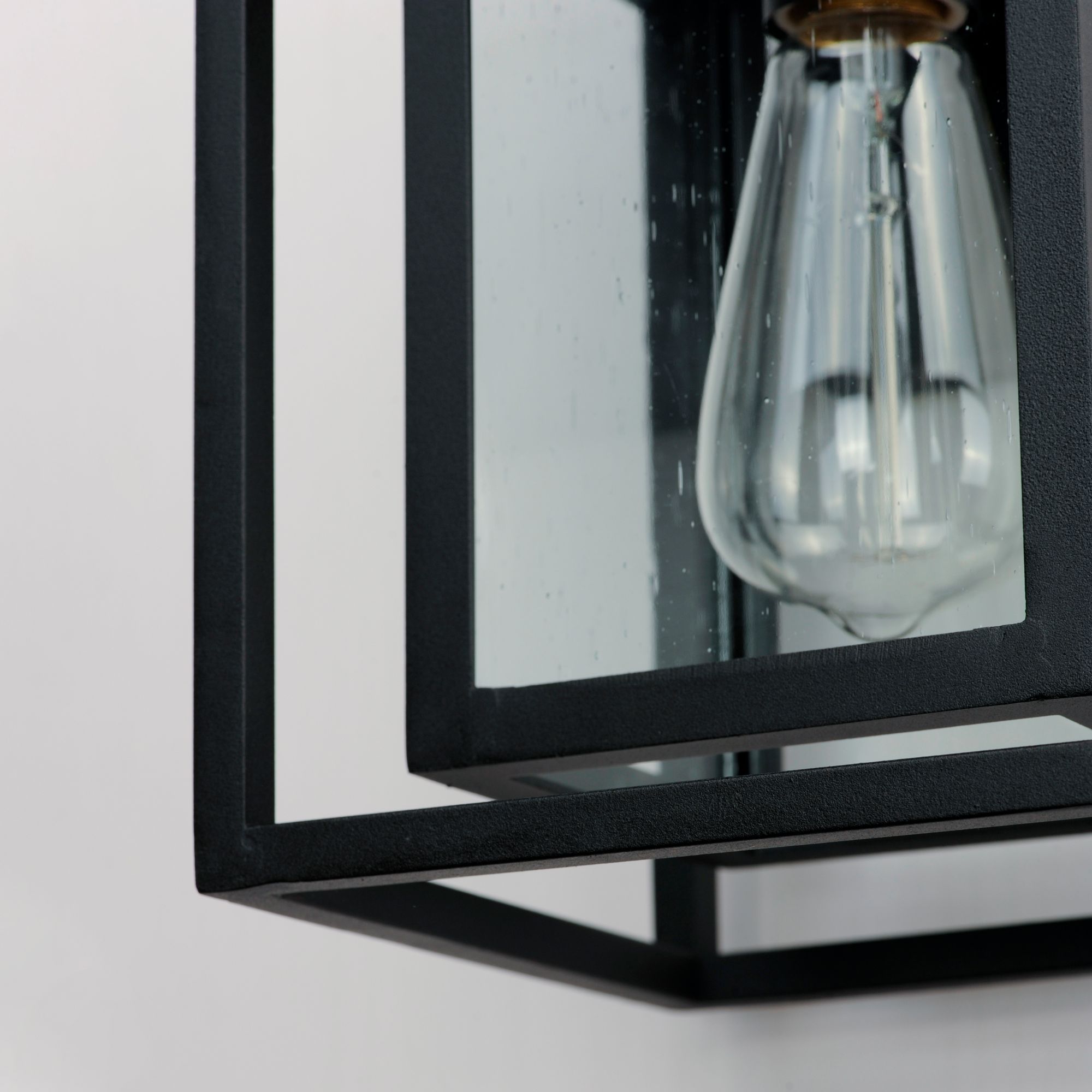 Maxim Cabana 11" High Black and Seeded Glass Outdoor Wall Light