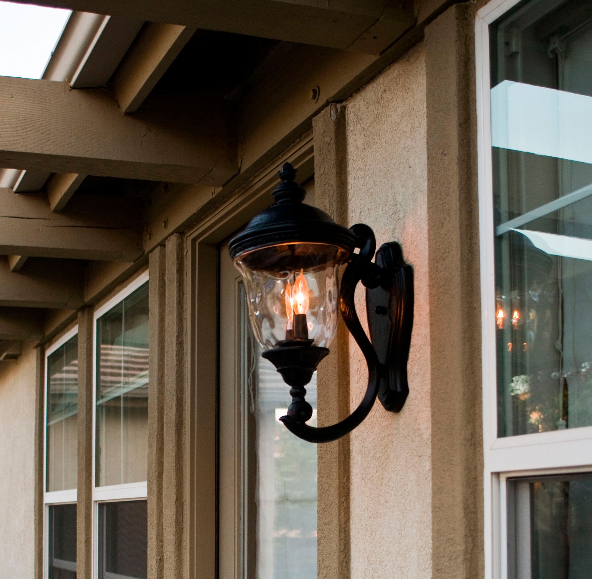 Maxim Carriage House 20" High Upbridge Arm Outdoor Wall Light in scene