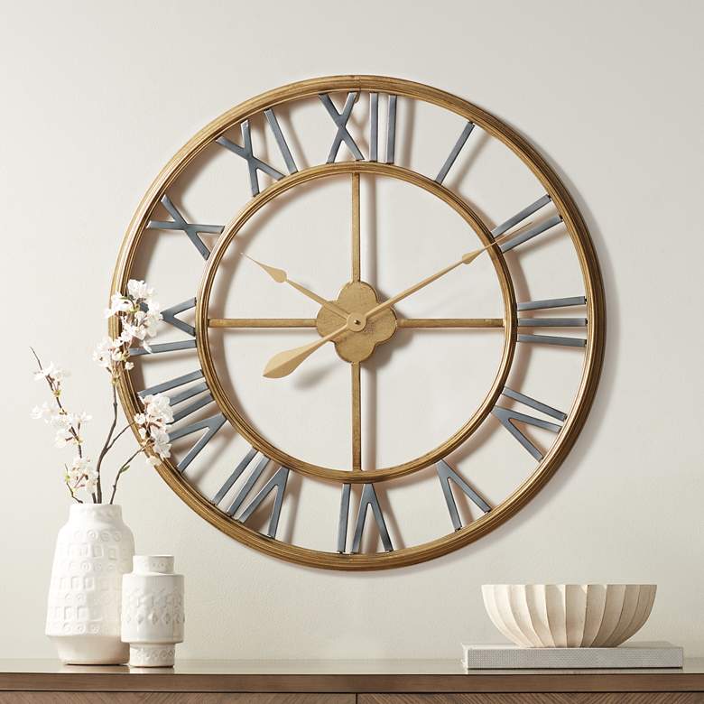 Image 1 Metallic Gold 28 3/4 inch Round Hand-Made Iron Wall Clock