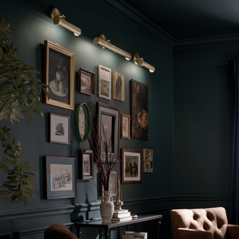 Midi 18 Inch Picture Light in Champagne Bronze in scene